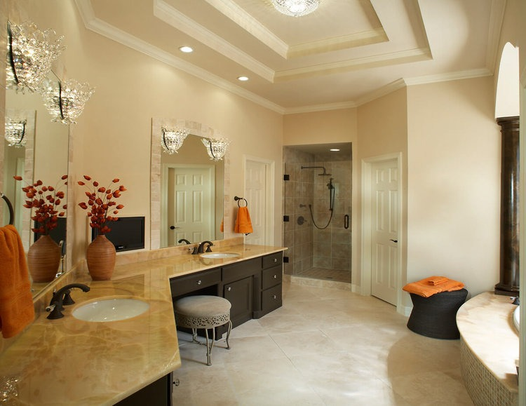 Brightly lit bathroom with natural light and soft overhead lighting, creating a welcoming and functional space.