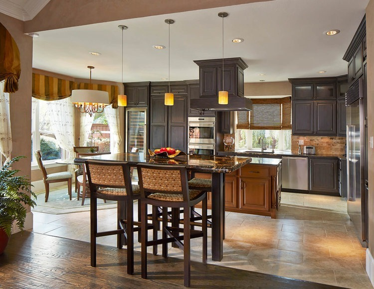 Kitchen remodeling featuring custom wooden cabinetry with a modern design.